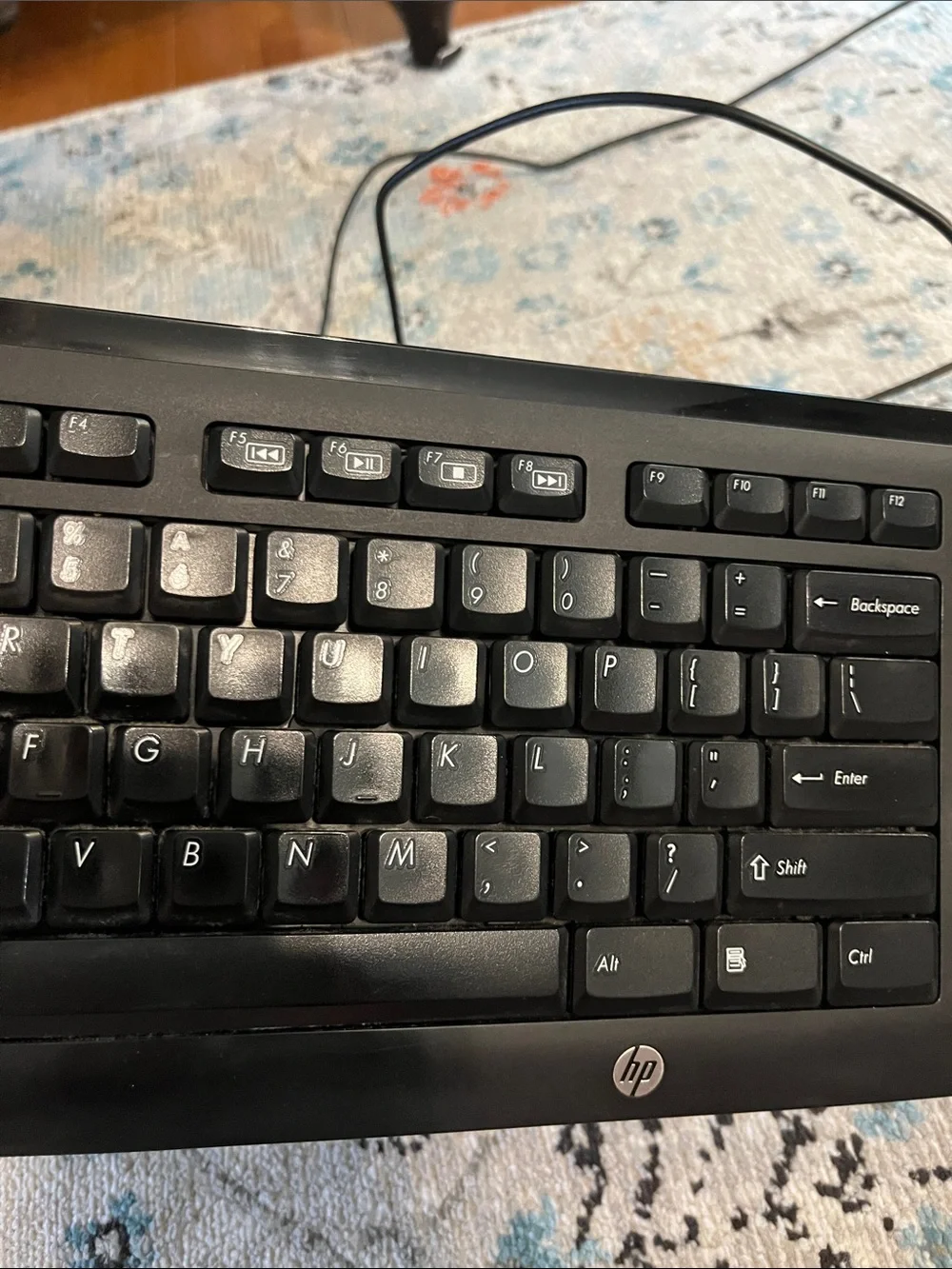 HP black keyboard model KU-1060